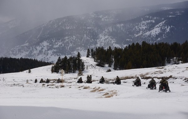 10th SFGA Soldiers drive snowmobiles to an objective during winter warfare training in Colorado. Photo by SGT Timothy Clegg, March 7, 2016.