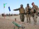 German advisors at TAAC North review a sand table depicting an exercise plan. RS HQs photo February 16, 2018.