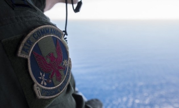 1st SOS crew member looks out over the crash site of STRAY 59 - a MC-130E that crashed 37 years ago. (photo SSgt Matthew Fredericks, 18th Wing Public Affairs, Feb 26, 2018).