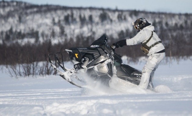 10th Special Forces member on a snow machine during a four week long winter warfare training exercise in Sweden. (photo by SSG Matthew Britton, SOCEUR, February 28, 20180.