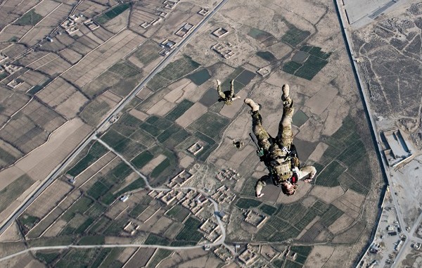 U.S. Air Force PJs and combat rescue officers conduct a HALO military free fall jump working with a C-130J Super Hercules flown by the 774th EAS. Photo by Tech Sgt Gregory Brook, ARCENT Combat Camera, Afghanistan, March 12, 2018.