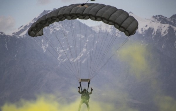 USAF pararescueman parachutes over Bagram Air Field, Afghanistan after exiting in MFF from a C=130J Super Hercules. (photo Tech Sgt Gregory Brook, AFCENT PA, March 23, 2018).