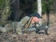 SFQC Candidate low crawls with M240B machine gun during in Robin Sage. Photo by Ken Kassens, SWCS, Dec 12, 2018.