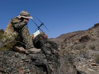 STS Airman at NTC coordinates fires. Photo by Staff Sgt Rose Gudx, USAF, Sep 2, 2018.