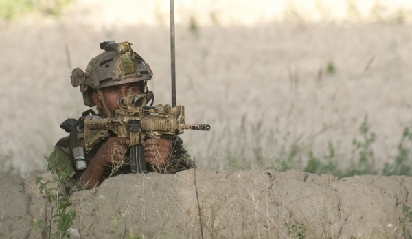 Afghan Commando provides overwatch during operations in Deh Bala district, Nangarhar province, Afghanistan.