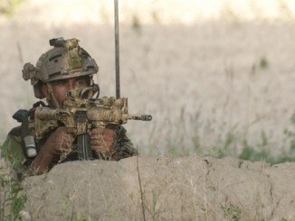 Afghan Commando provides overwatch during operations in Deh Bala district, Nangarhar province, Afghanistan.