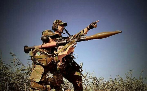 Afghan Commandos identify Taliban enemy positions, and prepare to fire a Rocket Propelled Grenade (RPG) in order to disrupt Taliban operation cells in Kohistan district, Faryab province on 24 August 2018 (Photo courtesy ANASOC Public Affairs Office / Lt. Col Qayoom Nuristani).