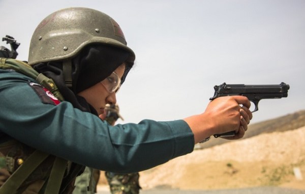 Female Police Officer of the Afghan General Command of Police Special Units fires pistol on range. (Photo by SPC Austin Boucher, NATO Special Operations Component Command - Afghanistan, Apr 4, 2018).