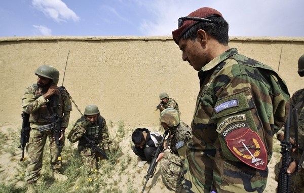 A element of the Afghan National Army Special Operations Command (ANASOC) making comms in the field. DOD photo, April 2019.