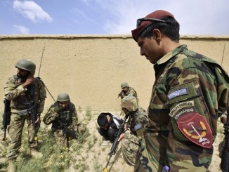 A element of the Afghan National Army Special Operations Command (ANASOC) making comms in the field. DOD photo, April 2019.