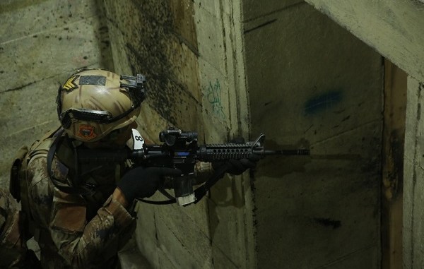 Student in the Advance Operators Training Course (AOTC) clears a room in live fire shoot house in Baghdad, Iraq on December 19, 2019. Photo by SGT Brandon Franklin, 10th SFGA.