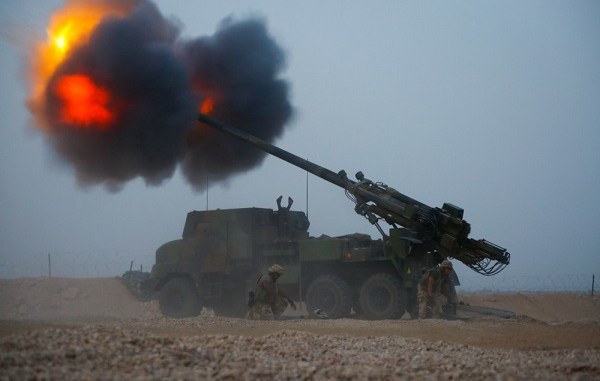 Task Force Wagram conducts a fire mission from Firebase Saham, Iraq in support of Operation Roundup. Photo by Specialist Gyasi Thomasson, CJTF-OIR, October 21, 2018.