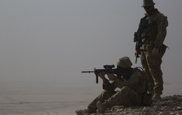 An Australian soldier scans the horizon in Iraq. Phot by Specialist Eric Cerami, US Army, Oct 1, 2018.