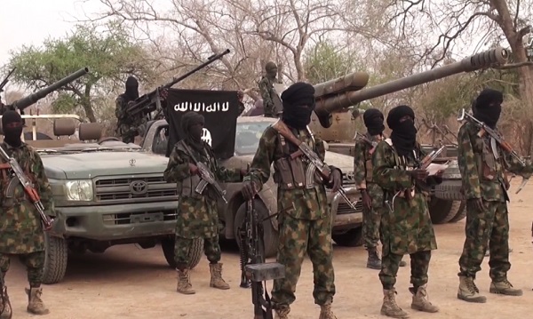 Photo of a group of Boko Haram fighters line up in this still taken from a propaganda video dated March 31, 2016. Cover photo for a CTC report on Boko Haram dated May 9, 2018.