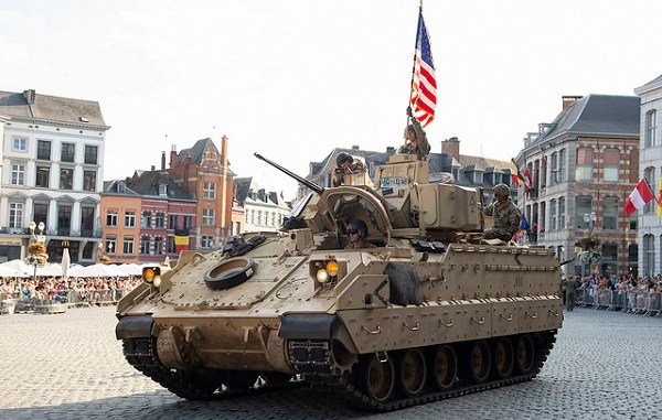 Bradley Fighting Vehicle (BFV) participating in a parade celebrating the liberation of Mons, Belguim in WWII. Petty Officer 2nd Class Brett Dodge, NATO, Sep 2, 2018.