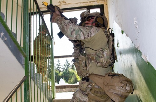 A member of 20th Special Forces Group clears a stairwell during Exercise Black Swan 2017 (Photo SSG Aaron Duncan, SOCEUR, July 19, 2017.