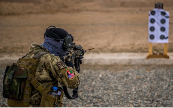 A member of a Female Tactical Platoon Afghanistan of the ASSF fires weapon on rifle range. Photo by SSG Douglas Ellis, NSOCC-A, March 13, 2018.