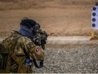 A member of a Female Tactical Platoon Afghanistan of the ASSF fires weapon on rifle range. Photo by SSG Douglas Ellis, NSOCC-A, March 13, 2018.