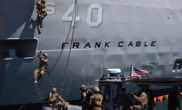 Marines from Force Recon company board a ship in Guam. (Photo by CPL Carl King, 3rd Marine Division, March 21, 2018).