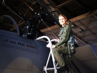 Capt. Kaci Dixon, an Intelligence Officer with AFSOC, poses for a photo before an incentive flight on an F-15 (AF photo, March 2014).