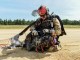 Master Sgt. Rudy Parsons, pararescueman for the 123rd Special Tactics Squadron, and Callie, his search and rescue K-9, land at Fort McCoy, Wis. July 17, 2019, as part of an domestic operations exercise. Callie is currently the only search and rescue dog in the Department of Defense. (U.S. Air National Guard photo by Staff Sgt. Joshua Horton)