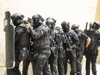 Kuwaiti MoI SWAT team prepare to breach a building during exercise at the Kuwait Special Forces Training Center on May 2, 2019.