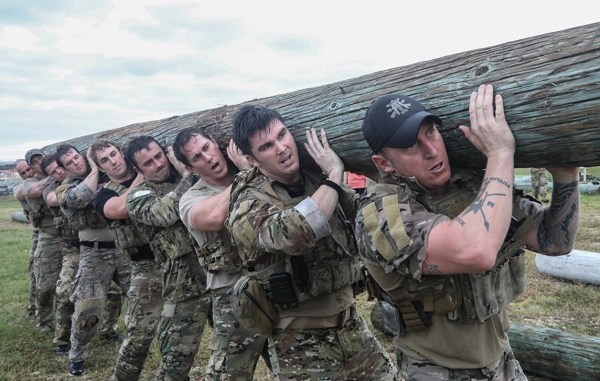 Soldiers assigned to 1st Special Forces Group conduct a log carry drill during an endurance event at Torii Station, Okinawa, Japan. (photo by SSG Kwadwo Frimpong, Nov 30, 2017).