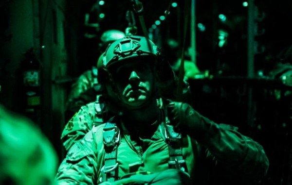 Soldier from the 10th Special Forces Group at Fort Carson, Colorado prepares for a night static line parachute jump from a C-130 aircraft. (Photo by SGT Connor Mendez, U.S. Army, October 24, 2017).