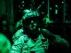 Soldier from the 10th Special Forces Group at Fort Carson, Colorado prepares for a night static line parachute jump from a C-130 aircraft. (Photo by SGT Connor Mendez, U.S. Army, October 24, 2017).