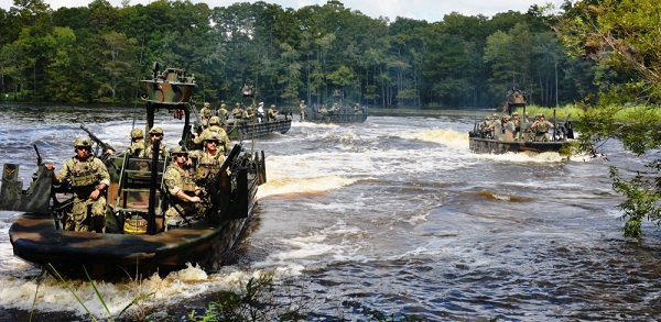 Small Boat Team 22 performs a simulated hot extraction utilizing Special Operations Craft Riverine. Photo by Angela Fry, NSCITTS, Sep 7, 2018.