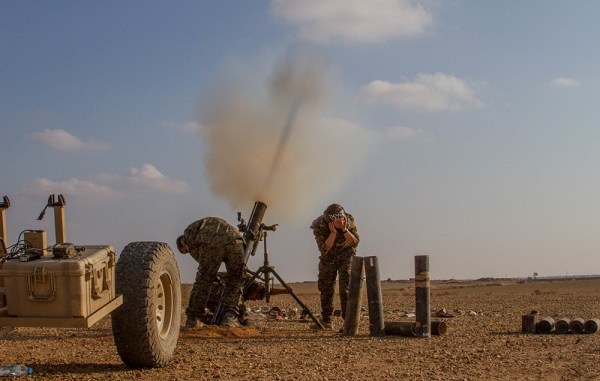 SDF mortar team fires 120mm at ISIS target near Deir ez-Zor in the Middle Euphrates River Valley, Syria. Photo by SGT Matthew Crane, CJTF-OIR, November 16, 2018.