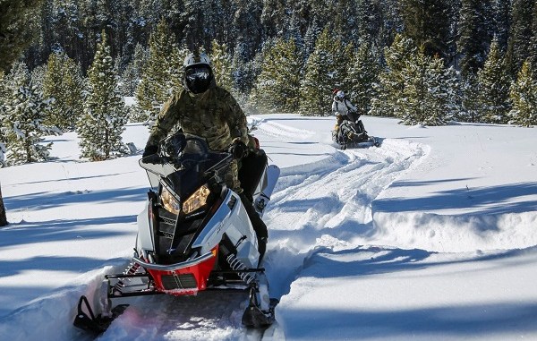 10th Special Forces Group Soldiers riding snowmobiles during training. 10th SFGA FB 20200127.