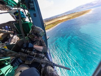 Special Forces Sniper on Helicopter