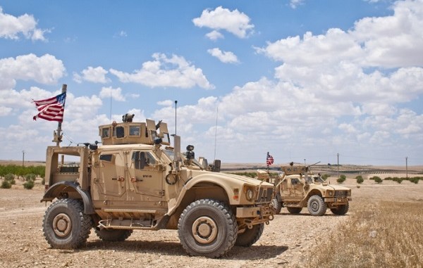 US tactical vehicle provides security on roads near Manbij, Syria. Photo by Staff Sgt. Timothy Koster, Combined Joint Task Force - Operation Inherent Resolve, June 20, 2018.