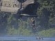 1st SFGA Soldier ascends a ladder to board helicopter while conducting water operations training. (Photo by SGT Codie Mendenhall, July 25, 2017).