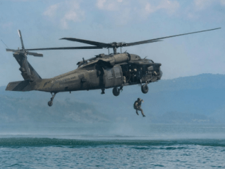 A Salvadoran Special Forces Soldier helocasts from a UH-60 Blackhawk in Dec 2016 during Operation Serpiente (photo by MSG Kerri Spero, JTF Bravo).