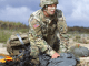 Parachutist gathers his parachute after airborne operation. (Photo by PFC James Dutkavich, Sep 12, 2016)